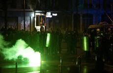 French police fire tear gas as hundreds of thousands protest pension reform plans