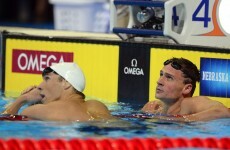 Lochte edges Phelps to set up freestyle showdown