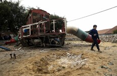 Israeli minister defends bulldozer being used to pick up man's body