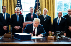 Trump signs off on $2.2 trillion rescue package as Covid-19 cases reach over 100,000 in the US