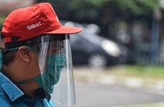 Indonesia locks virus violators in 'haunted house'