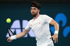 Georgian tennis star charged with assaulting ex-wife