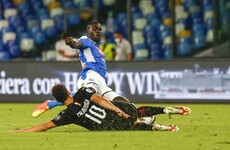 Milan still chasing European spot after battling Napoli to a draw
