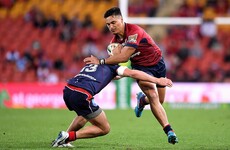 Young Wallaby hot shot scores emotional try as Reds hold off charging Rebels