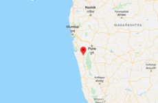 At least 70 people feared trapped after five-storey building collapses in India