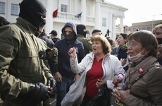 Belarus police detain dozens of female protesters as thousands take to the streets