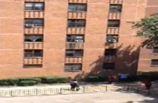 VIDEO: Neighbour catches seven-year-old girl who fell from window