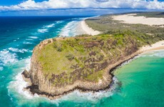 Australian firefighters struggling to control massive bush fire on heritage-listed island