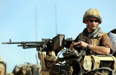 Prince Harry sues British tabloid over marines claim