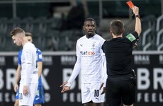 Gladbach fine player a month's wages for spitting at opponent