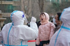 China seals off two cities and bans millions of people from leaving in bid to stem new Covid-19 outbreak
