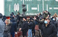 Netherlands anti-curfew protests spark clashes with police