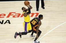 Davis and LeBron lead Lakers past Hawks as heckling fans ejected from arena