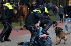 Dutch police break up anti-government protest on eve of election