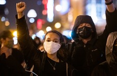 Protests in Minneapolis after fatal shooting of black man by officer who 'drew handgun instead of taser'