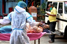 Raging virus outbreaks in India and Brazil fuel record level Covid-19 cases