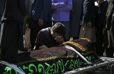 Afghans bury dead from bloody school blasts