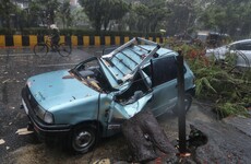 At least 33 dead and over 90 people missing as cyclone batters Covid-stricken India