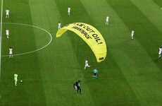 Activist lands on pitch before Germany-France match, 'injures several fans'