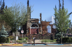 Churches set ablaze as nearly 200 unmarked graves found at Canada indigenous school