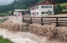 Merkel visits ravaged German villages as death toll from worst European flooding in living memory rises to 183