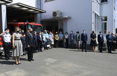 Belgium holds a day of mourning as Angela Merkel visits flood victims in Germany