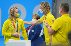 Australian swim coach apologises for tearing off mask in viral video