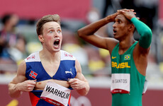 Warholm storms to world record in hurdles epic, Mihambo takes long jump gold