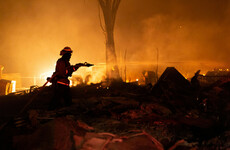 Thousands evacuate fast-moving California wildfire