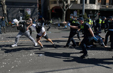 Hundreds arrested in Australia protests as country faces its worst Covid-19 rise
