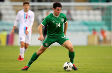 Last year, he was working in SuperValu. Now, he's representing Ireland
