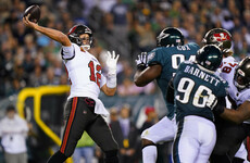 Brady shrugs off thumb injury to throw two touchdown passes as Bucs edge out Eagles