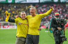 Haaland scores twice on comeback as Dortmund go top