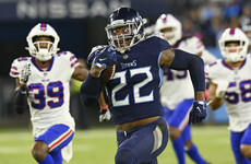 Henry scores three rushing touchdowns as Titans hold firm against Bills