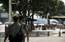 Armed police parade alleged Covid rule breakers through streets, sparking backlash in China