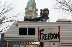 Canadian police threaten to arrest truckers blocking up Ottawa as Trudeau slams 'unacceptable' protests