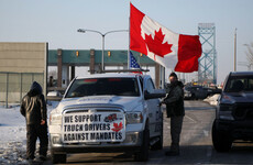 Police move in to clear anti-vaccine convoy protesters from key border bridge in Canada