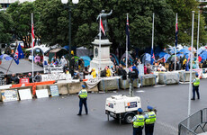 New Zealand virus cases spike as anti-vaccine protesters claim win