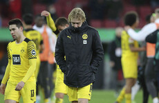 Dortmund held at Augbsurg to leave Bayern eight points clear