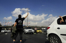 Iran charges 11 over killing of paramilitary member at ceremony for slain protester