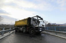 Serbs start removing barricades in easing of tensions in Kosovo
