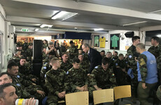 Tánaiste urges Irish troops to reach out for support following the death of Seán Rooney