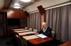 Darkened plane, silent overnight train: Biden's secret journey to Kyiv