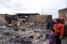 Search for survivors following deadly Indonesia fuel depot fire that killed at least 18 people
