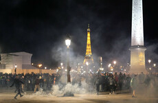 Police clash with protesters in Paris as Macron forces through pension reform without vote