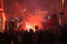 Roads blocked and strikes escalated after Macron pushes through pension reform