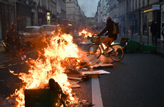 France's Macron signs controversial pension reform bill into law despite protests