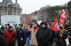 Thousands protest against French government's migration plans