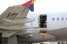 South Korean plane lands safely after passenger opens door during runway approach