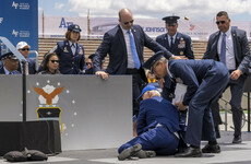 Joe Biden trips and tumbles on stage after delivering address at military academy